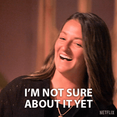 Woman Laughing Saying I'm Not Sure About It Yet GIF