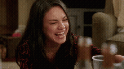Woman Laughing Sitting At Table GIF