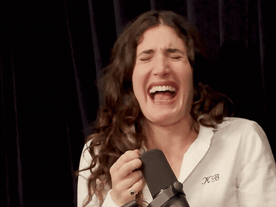 Woman Laughing Wearing XB Shirt GIF