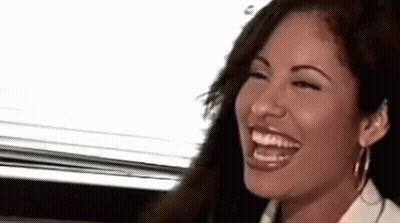 Woman Laughing With Eyes Closed In White Shirt GIF