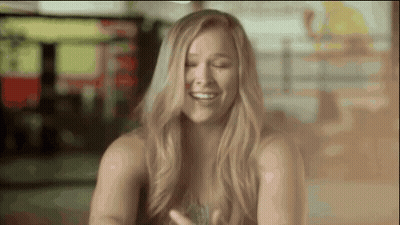 Woman Laughing With Hair Blowing GIF