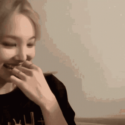 Woman Laughing With Hand On Mouth GIF