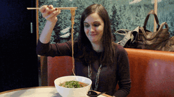 Woman Laughing With Her Noodles GIF