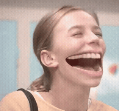 Woman Laughing With Open Mouth GIF