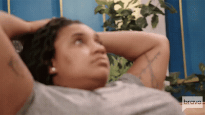 Woman Laying Down With Hands Behind Head Saying Bravo GIF