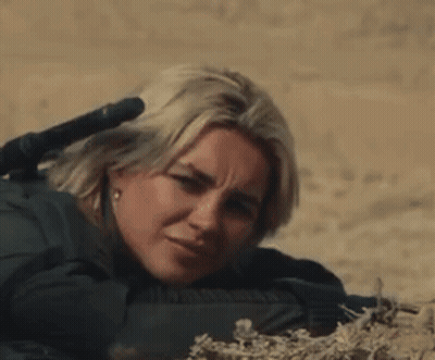 Woman Laying Down With Rifle GIF