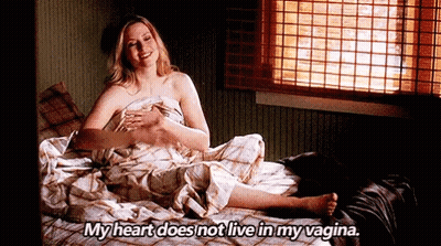 Woman Laying In Bed Wrapped In Blanket Saying My Heart Does Not Live In My Vagina GIF