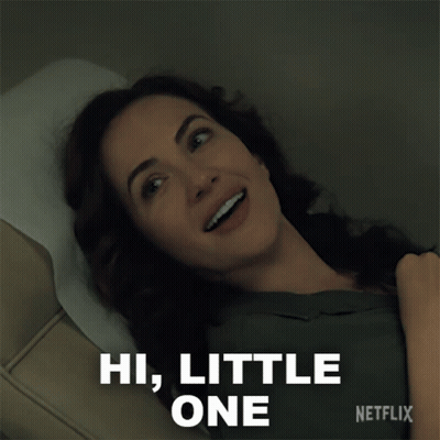 Woman Laying In Hospital Bed Saying Hi Little One GIF