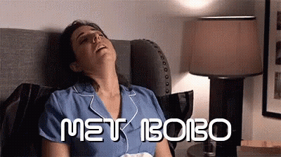 Woman Laying On Bed Eyes Closed Met Bobo GIF