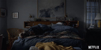 Woman Laying On Bed Netflix Ad GIF