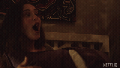 Woman Laying On Bed Netflix GIF