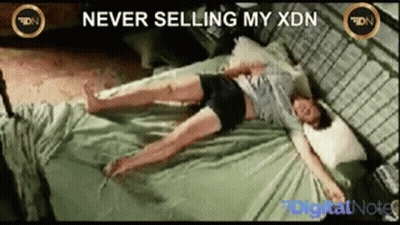 Woman Laying On Bed Never Selling My XDN GIF