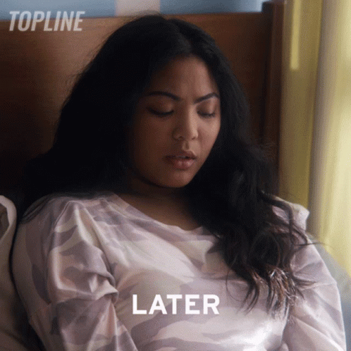 Woman Laying On Bed With Eyes Closed And Word Later GIF