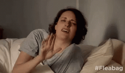 Woman Laying On Bed With Hands On Chest GIF