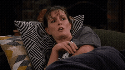 Woman Laying On Couch Wearing I Love You T-Shirt GIF