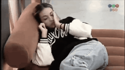 Woman Laying On Couch With Eyes Closed GIF