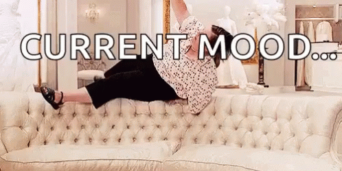 Woman Laying On Couch With Legs Up And Current Mood GIF