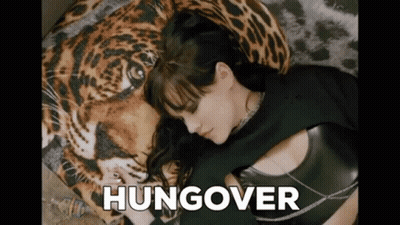 Woman Laying On Leopard Print Pillow Saying Hungover GIF