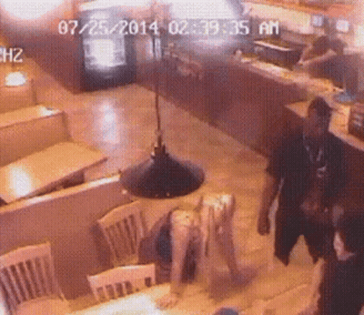 Woman Laying On Table July 2014 GIF