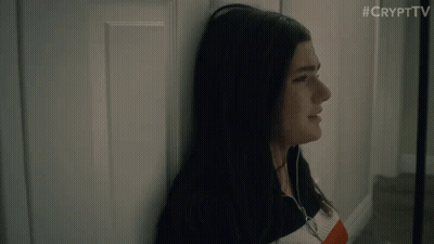 Woman Leaning Against Wall #Crypttv GIF
