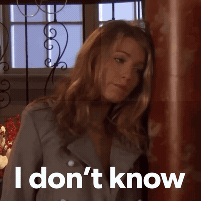 Woman Leaning Against Wall Saying I Don't Know GIF