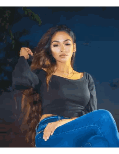 Woman Leaning Brick Wall Pink Top Blue Jeans Sticker