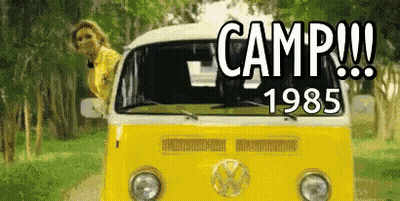 Woman Leaning Out Of Yellow Van Camp 1985 GIF