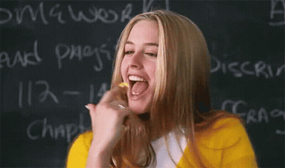 Woman Licking Finger Near Blackboard Homework GIF