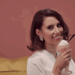 Woman Licking Whipped Cream GIF