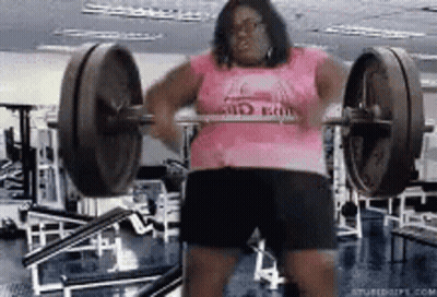 Woman Lifting Barbell In Gym GIF