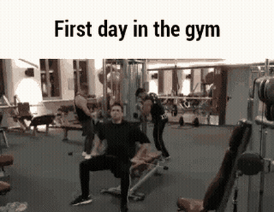 Woman Lifting Dumbbell In Front Of Tric Sign GIF
