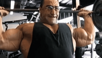 Woman Lifting Dumbbells In Gym GIF