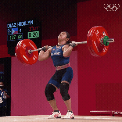 Woman Lifts Barbell With Diaz Hidilyn Behind Her GIF