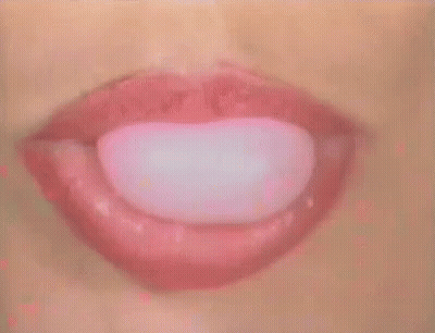 Woman Lips With Pink Flower Coming Out GIF