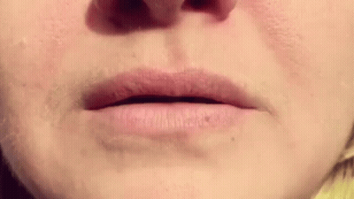 Woman Lips With Yellow Sweater GIF