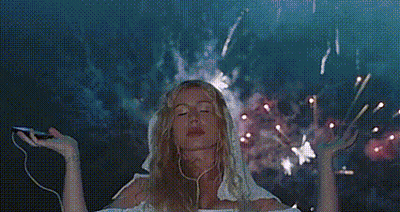Woman Listening To Music Watching Fireworks GIF