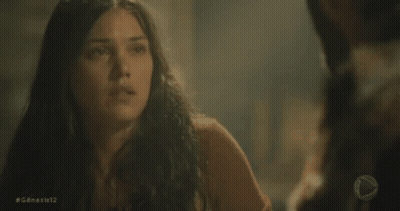 Woman Looking At Another Woman In Dark Room GIF