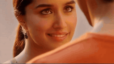 Woman Looking At Man GIF