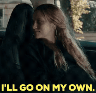 Woman Looking At Man On Bed GIF