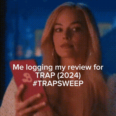 Woman Looking At Phone Me Logging My Review For Trap 2024 GIF