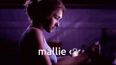 Woman Looking At Phone With Mallie < 3 GIF
