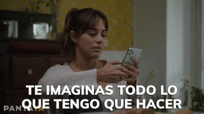 Woman Looking At Phone With Te Imaginas Todo Lo Que Tengo Que Hacer GIF