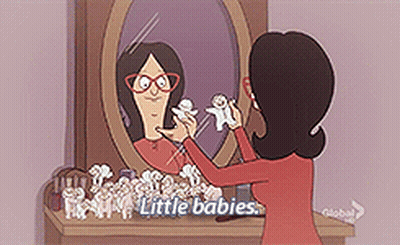 Woman Looking At Reflection In Mirror Saying Little Babies GIF