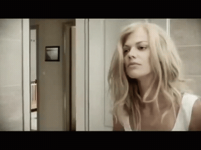 Woman Looking In Mirror GIF