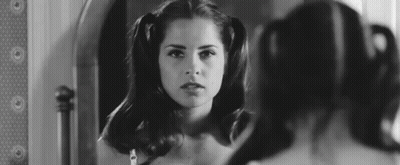 Woman Looking In Mirror Black And White GIF