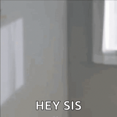 Woman Looking In Mirror Saying Hey Sis GIF