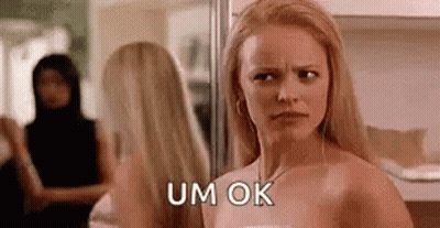 Woman Looking In Mirror Saying Um Ok GIF