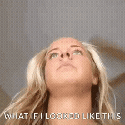 Woman Looking Up Saying What If I Looked Like This GIF