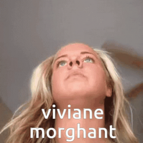 Woman Looking Up With Viviane Morgant Written On Her Face GIF