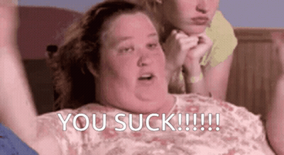Woman Lying Bed Hands Raised Saying You Suck GIF